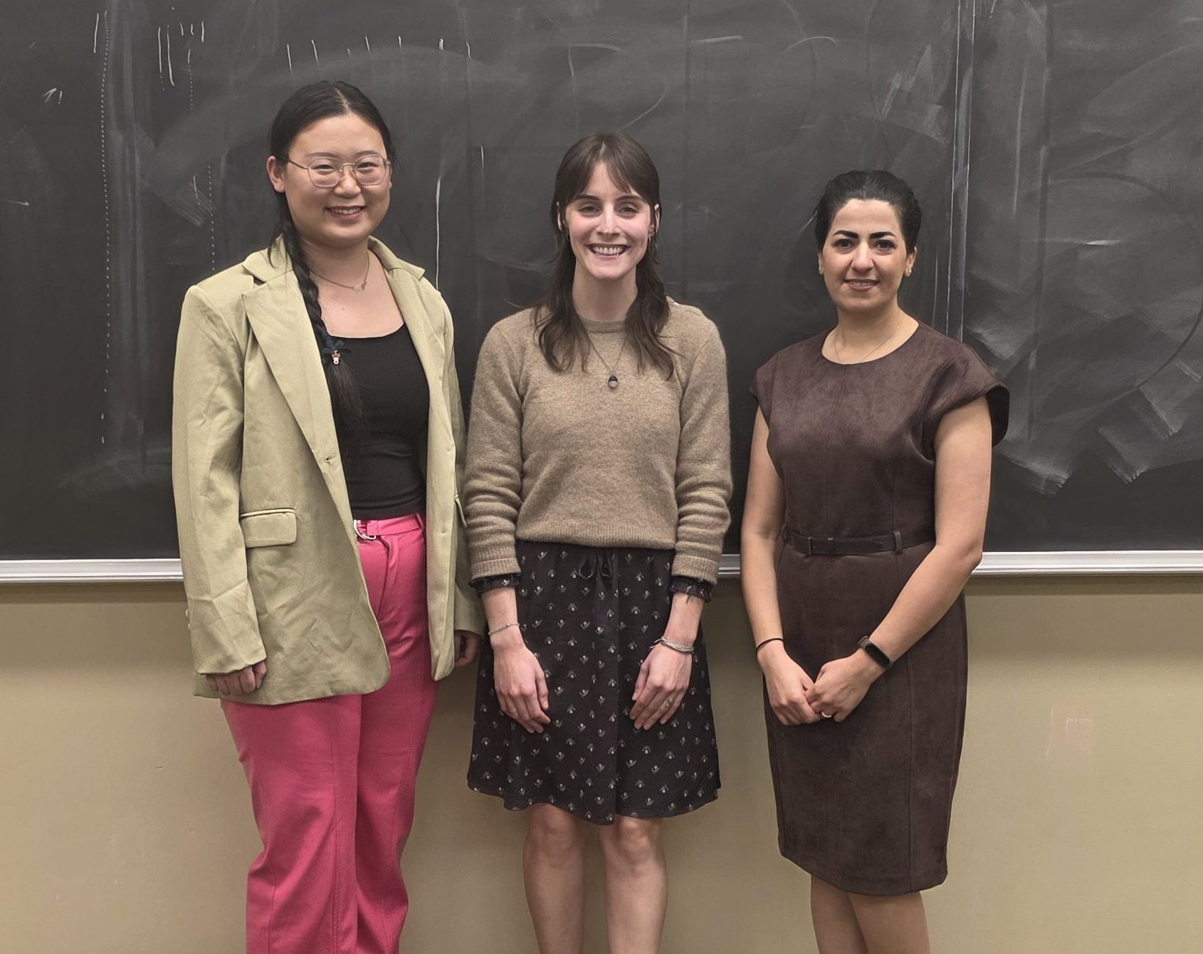 Xin Qi Humphreville, Leah Gastonguay, and Soraya Nekouian smile at the camera